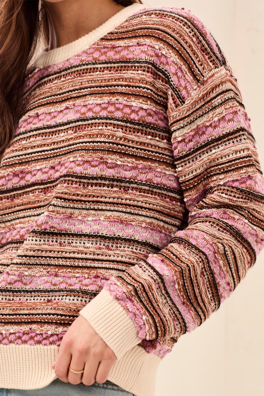 Model wearing Tribal textured yarn dye stripe crew neck sweater